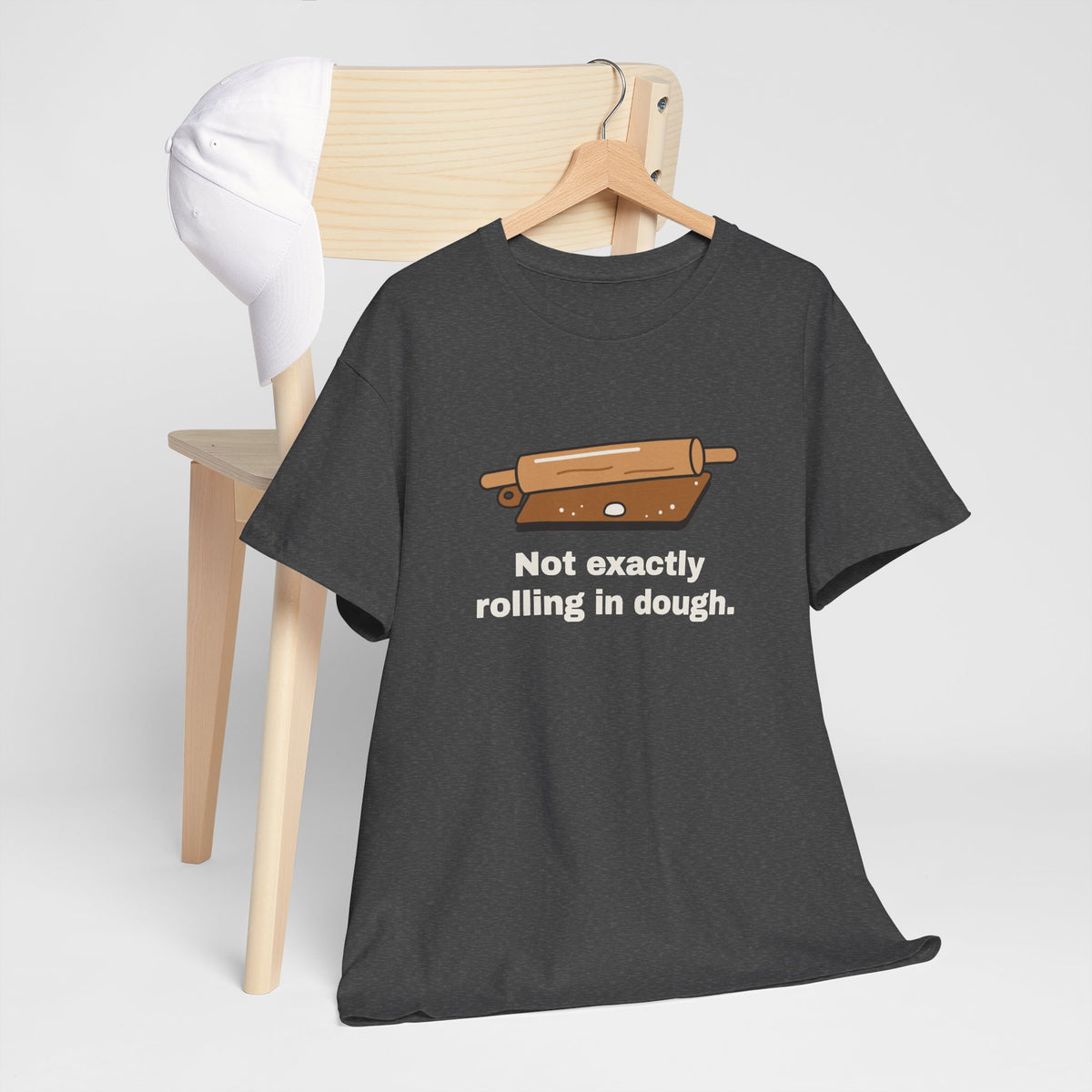Ansicht: Not Exactly Rolling in Dough – am Stuhl